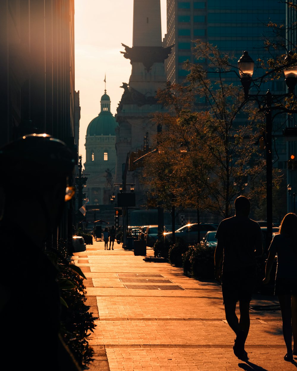 People walking along a downtown Indianapolis sidewalk